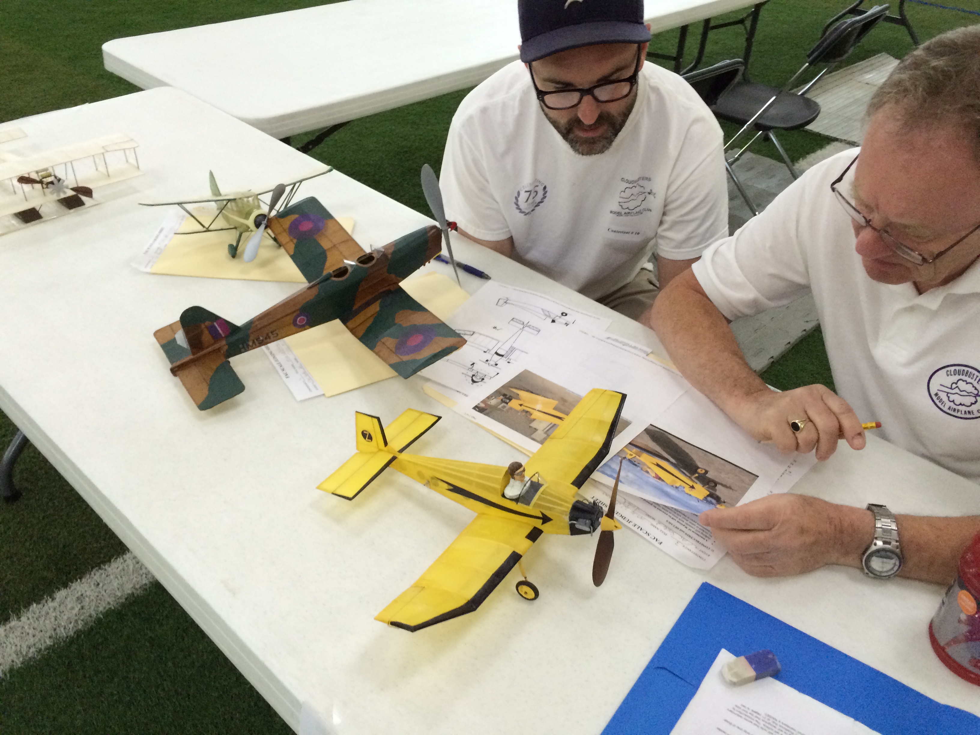 John Jackson (L) & Ted Allebone (R) judging Mike Welshans Jodel in Scale - Mike's Scale Winning Miles M-18 next in Line